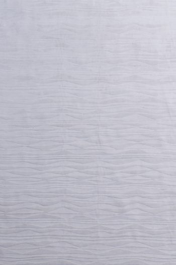 textured high low handmade rug in white wool