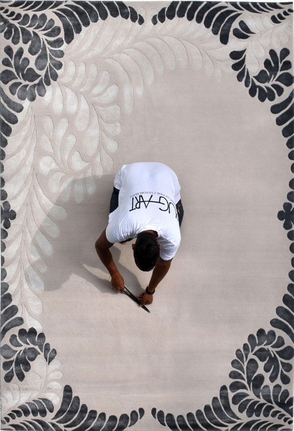 contemporary handmade floral design rug with high and low pile