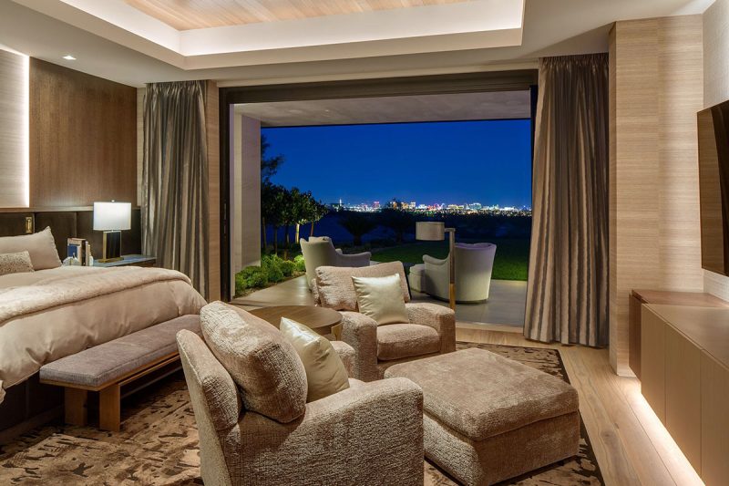 contemporary abstract rug design in wool and silk. brown rug. Stunning coastal bedroom design.
