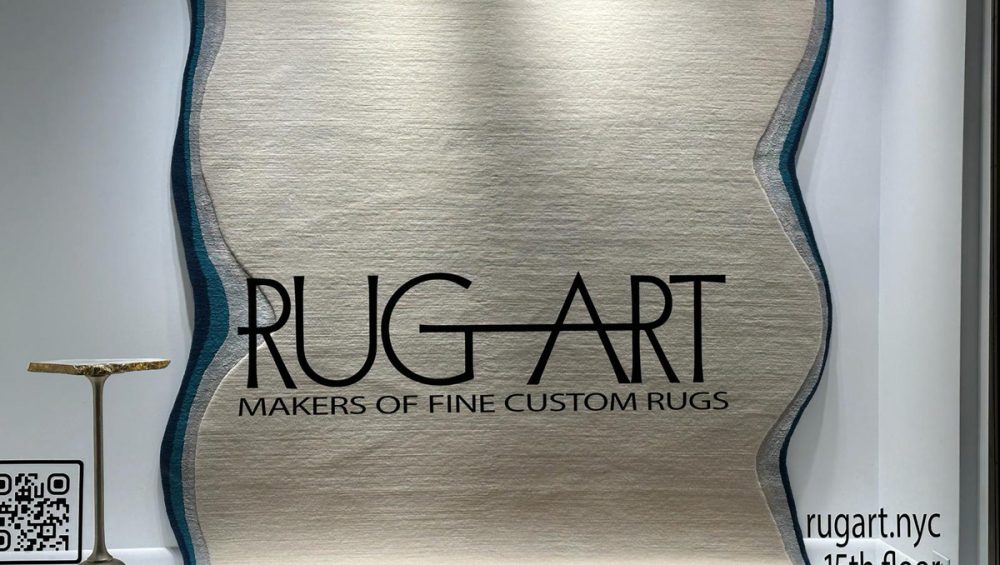odd shape rug with border in cream and blue from rug art nyc