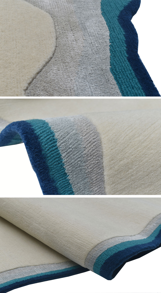odd shape rug with border in cream and blue from rug art nyc