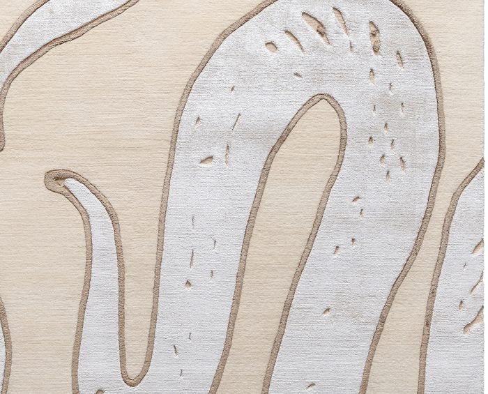 hand knotted edge detail of the imperial snake rug, crafted with high/low pile, using turkish weave for enhanced clarity