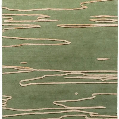 textured sage green area rug with raised tan organic pattern. Modern, biophilic rug design featuring dimensional high-low pile.